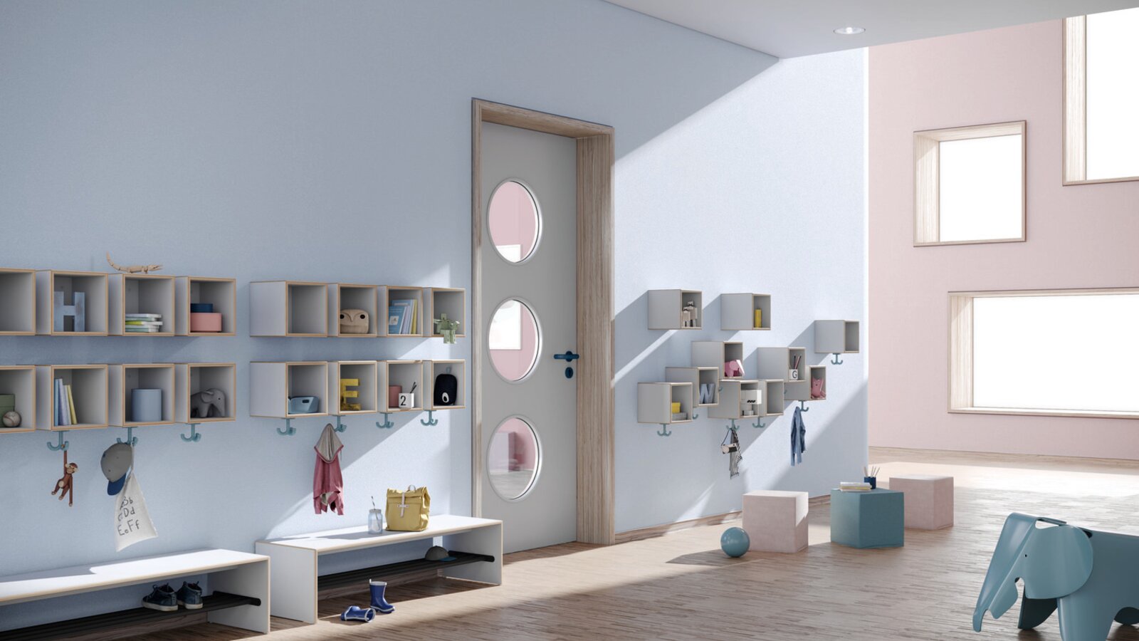 Blue-coloured kindergarten corridor with wall-mounted coat racks, triple hooks and seating