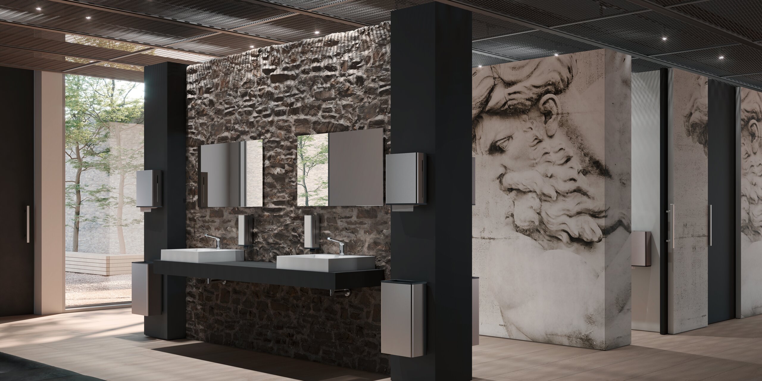 Public WC equipped with HEWI soap and paper towel dispensers in matt stainless steel