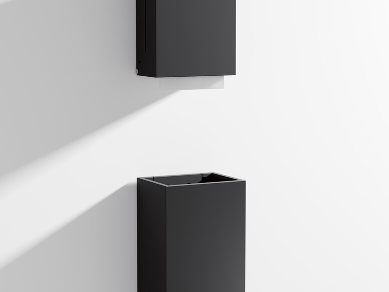 Paper towel dispenser and waste garbage can with angular design in matt black stainless steel